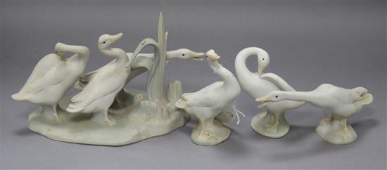 A Lladro goose group and three other models of geese
